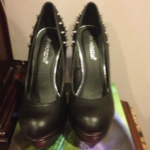 Black spiked heels