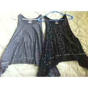 2 black and grey shark bite glitter tanks