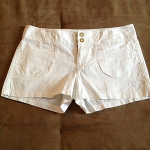 White express shorts with gold detail!