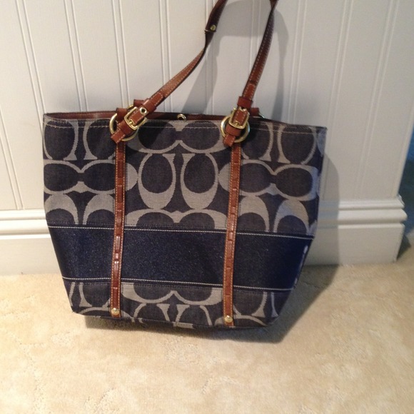 Coach purse with denim accents.