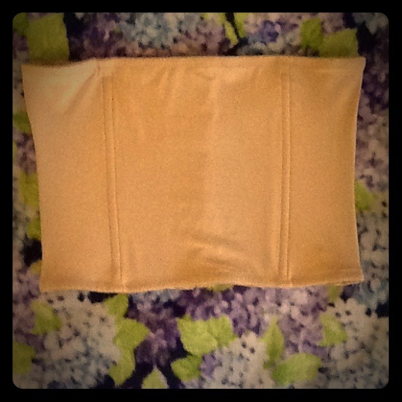 Waist nipper or corset