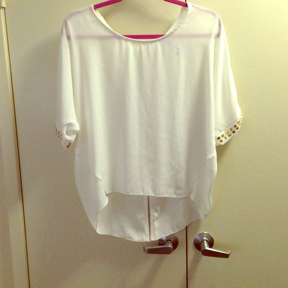 Beautiful white blouse with gold detail