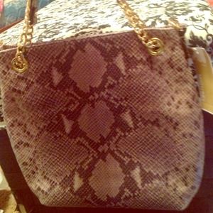 Authentic Michael Kors handbag new with tags