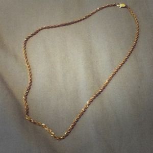 Men's gold chain necklace.