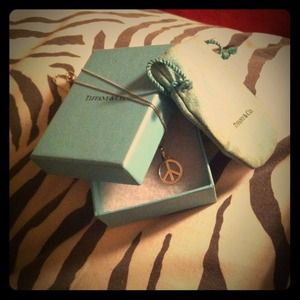 Tiffany & co peace sign necklace