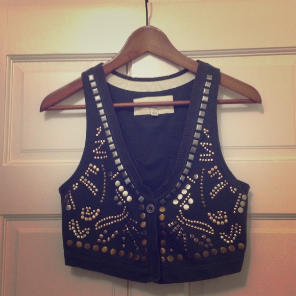Studded vest.
