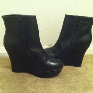 Black wedge boots