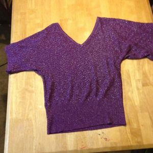 Purple sparkly sweater top. Open shoulder.