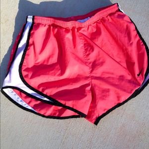 Pink Nike running shorts