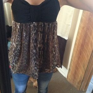 Cute animal print sequenced top!