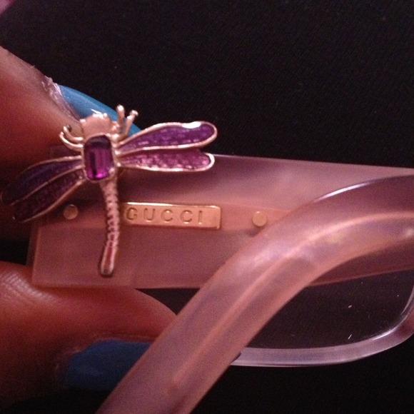 Gucci frames,  light pink, and a hint of purple.