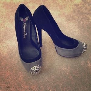 Black and gray suede pumps with silver gems on toe