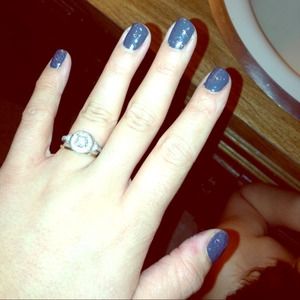 .57 ct center diamond. 1.14 total carat.