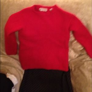 Red sweater and black dress pants