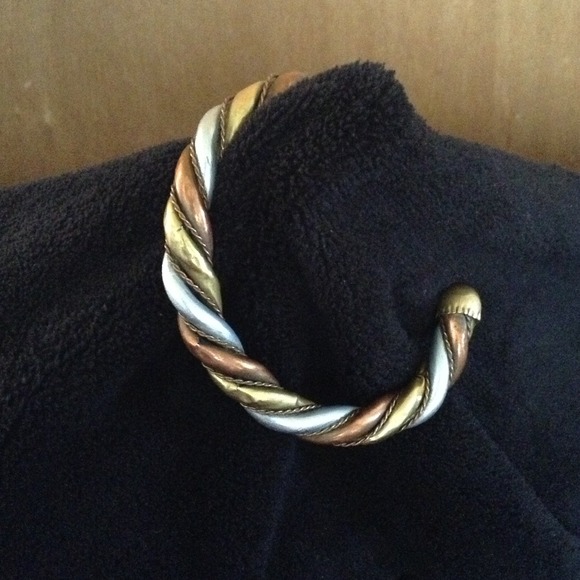 A tri- metal bracelet