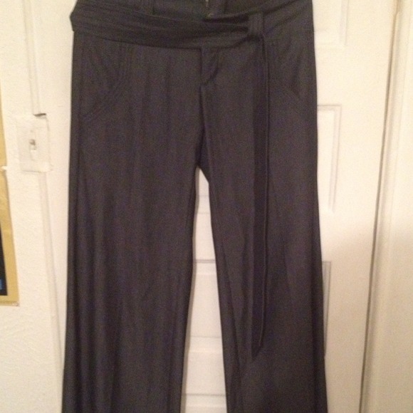Billy Blues dark wash blue jean trousers.