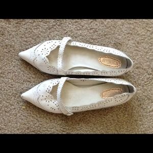White pointy shoes