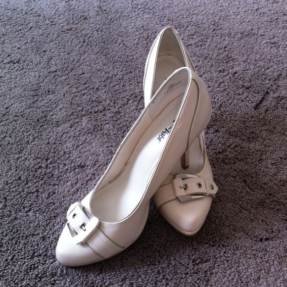 White leather pumps