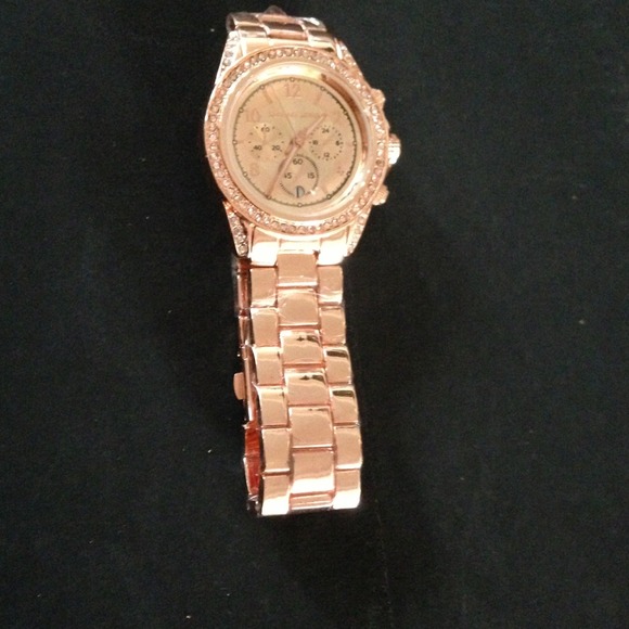Rose gold tone watch