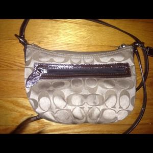 Authentic Crescent- shaped Coach purse.🎀