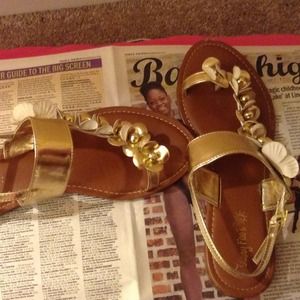 gold and while sandals