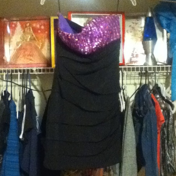 Purple sequined dress.