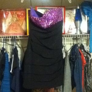Purple sequined dress.