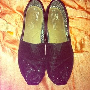 Sparkly Toms. Bought them from another posher.
