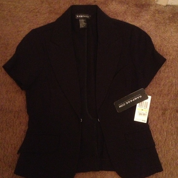 Black short sleeve suit jacket.