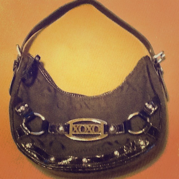 XOXO medium size black purse.