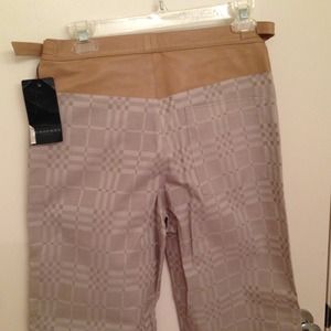Long tan Burberry pants.