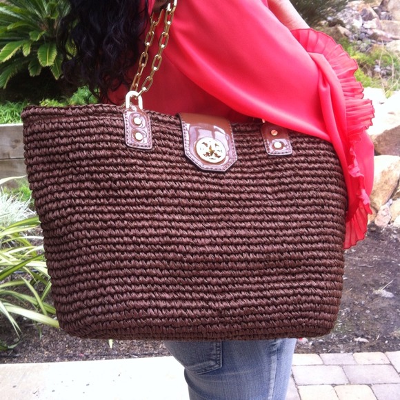 SOLD...................Tory Burch brown straw tote