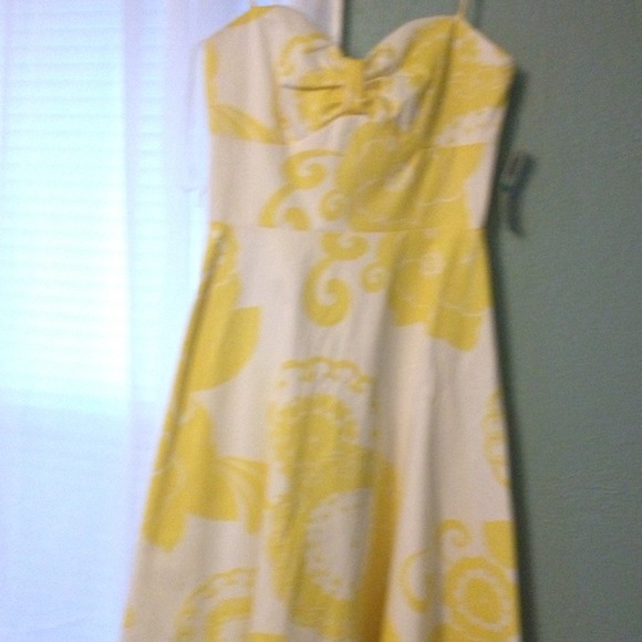 Yellow and white floral flared dress size 5/6