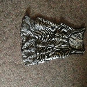 Black and white ruffled top.