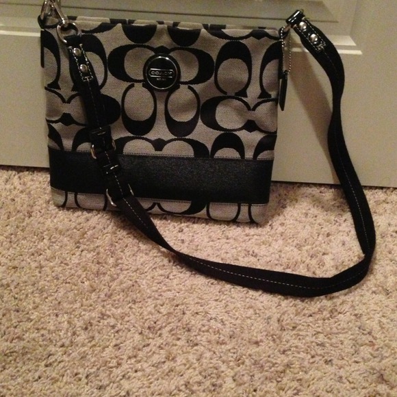 Authentic signature cross body bag