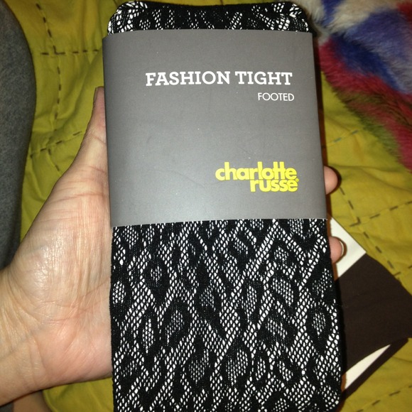 SOLD Black footed tights; cheetah print
