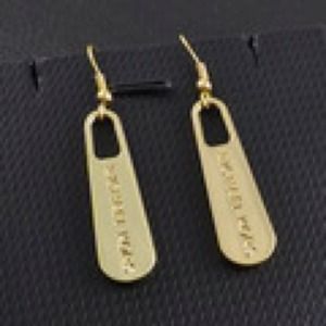 MK zipper earrings