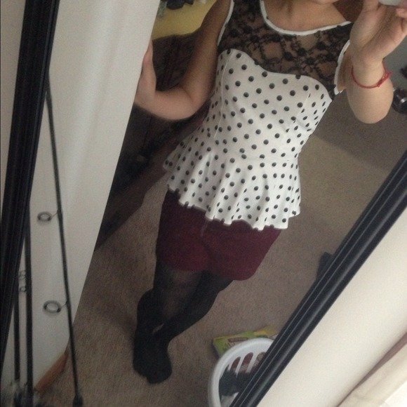 White w/ black polka dot peplum top. Very cute!