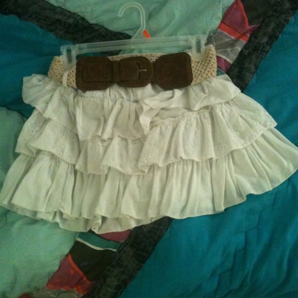 White skirt with brown belt
