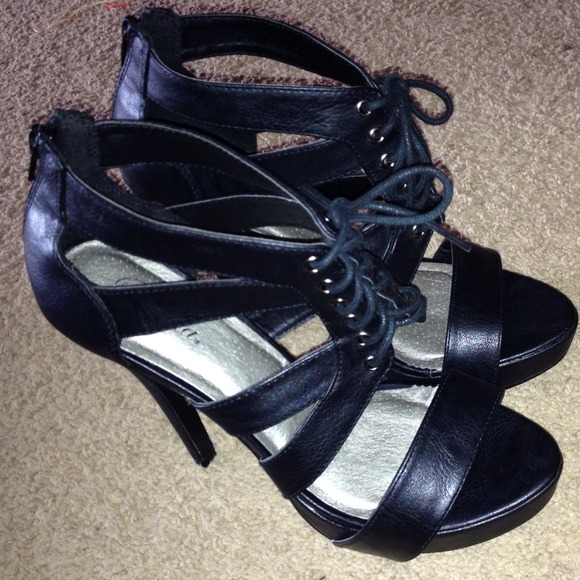 Brand new black pair of 3-4 inch heels.
