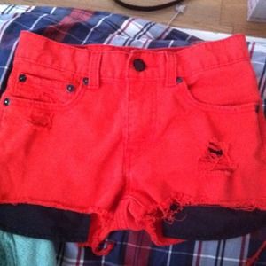 Orange High-waisted Levi's shorts