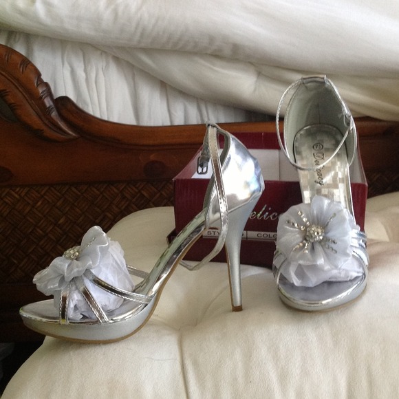 Never worn silver sandal