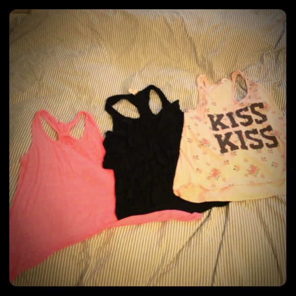 Three large racer back tanks !!!