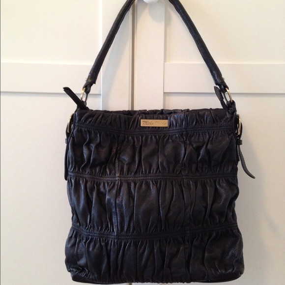 Mido Mido ruched pebble leather bag. Black.