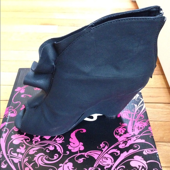 Black leather wedge heels