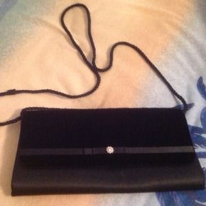 Black party purse, selling it for $75.00.