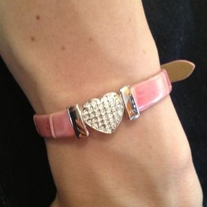 Silver heart on a pink bracelet