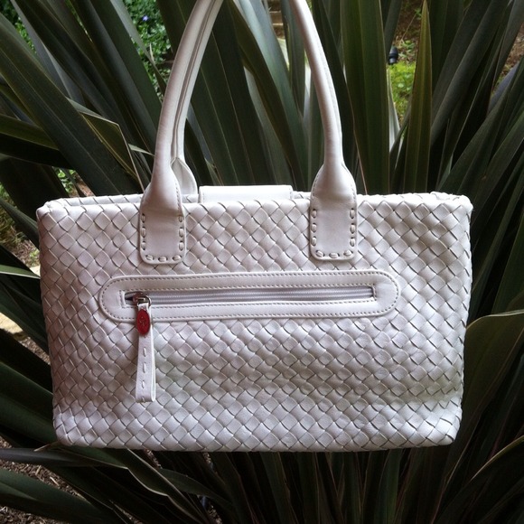 SOLD.................white woven Donald Pliner bag
