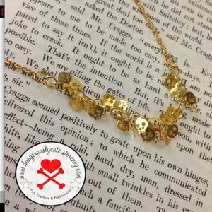Delicate tiny gold-plated skull necklace