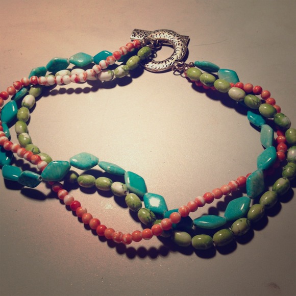 Beaded necklace. Orange green blue